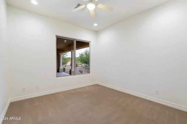 unfurnished room with carpet floors, baseboards, a ceiling fan, and recessed lighting