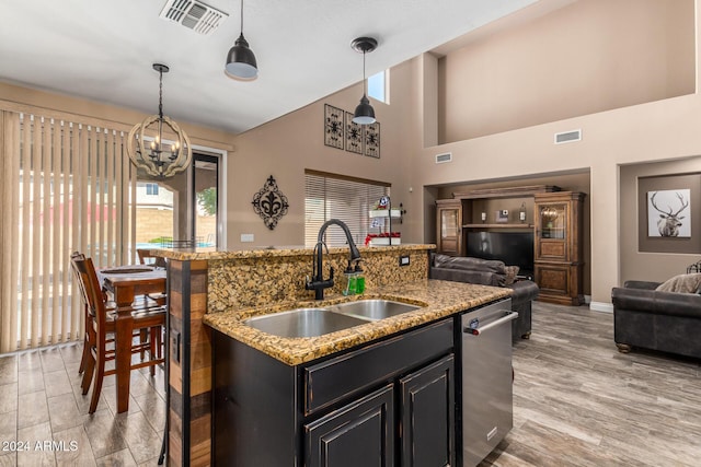 6084 W Yorktown Way, Florence, AZ 85132 - kitchen featuring visible vents, stainless steel dishwasher, a sink, a chandelier, and open floor plan