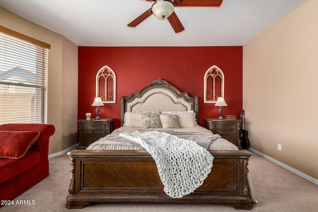 6084 W Yorktown Way, Florence, AZ 85132 - carpeted bedroom featuring baseboards, a ceiling fan, and an accent wall