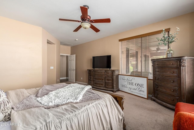6084 W Yorktown Way, Florence, AZ 85132 - carpeted bedroom with baseboards and ceiling fan