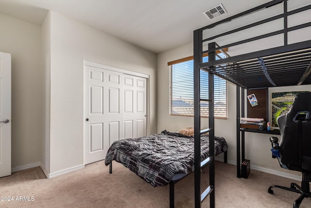 6084 W Yorktown Way, Florence, AZ 85132 - carpeted bedroom with baseboards, a closet, and visible vents