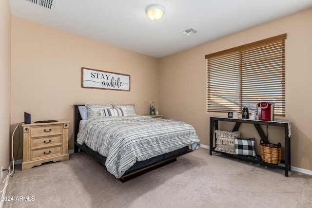 6084 W Yorktown Way, Florence, AZ 85132 - bedroom featuring baseboards, light carpet, and visible vents