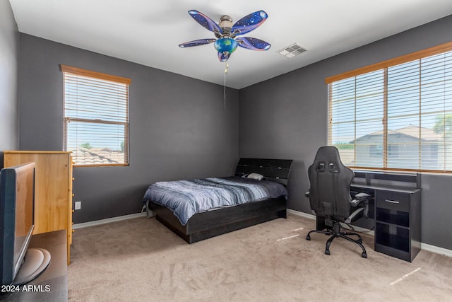 6084 W Yorktown Way, Florence, AZ 85132 - carpeted bedroom with baseboards, a ceiling fan, and visible vents