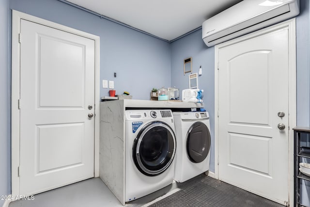 clothes washing area featuring separate washer and dryer and a wall mounted AC