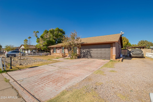 ranch-style home with a garage