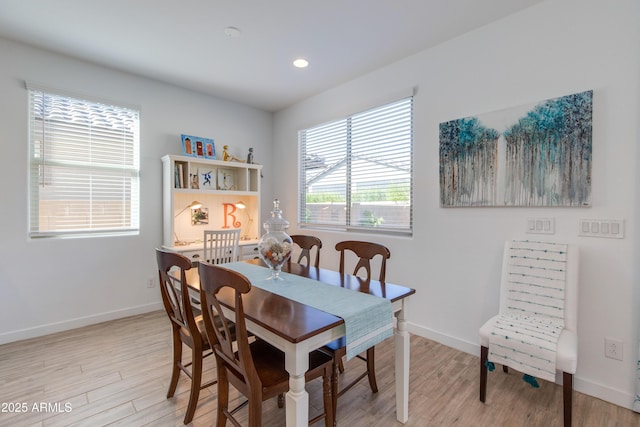 dining space featuring light hardwood / wood-style flooring