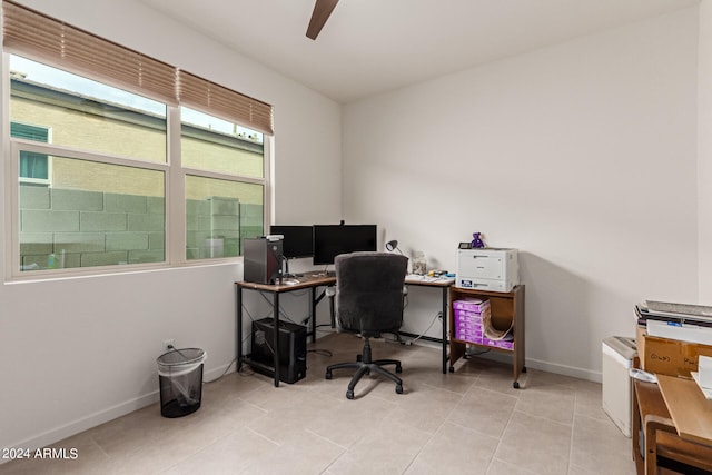 office featuring ceiling fan and light tile patterned flooring