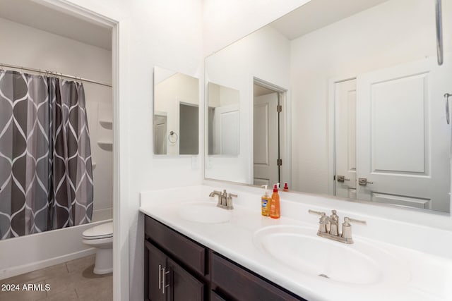 full bathroom featuring vanity, tile patterned flooring, toilet, and shower / bathtub combination with curtain