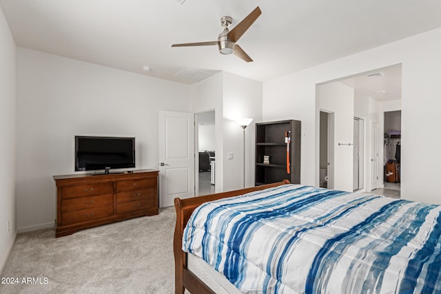 bedroom featuring ceiling fan and light colored carpet