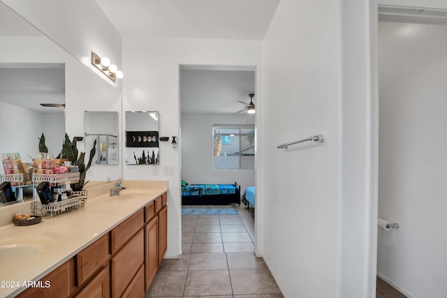 bathroom featuring vanity, tile patterned floors, and ceiling fan