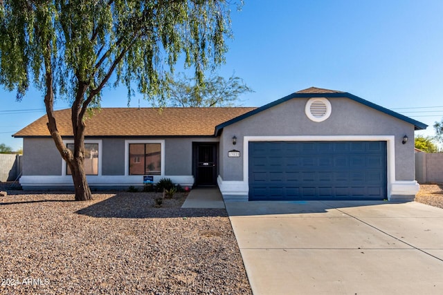 ranch-style house with a garage