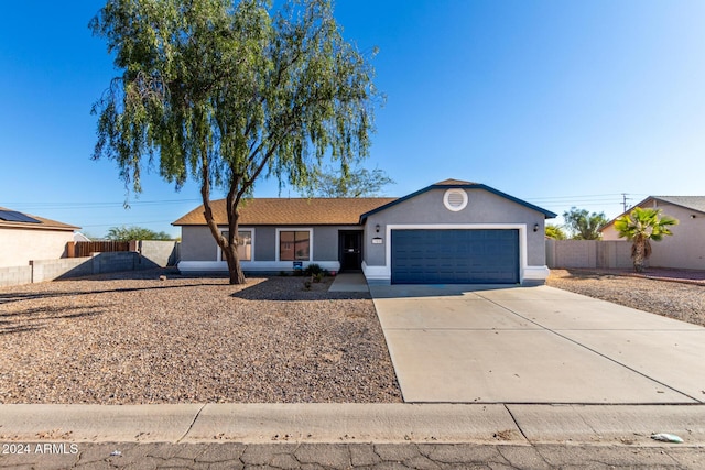 ranch-style house with a garage