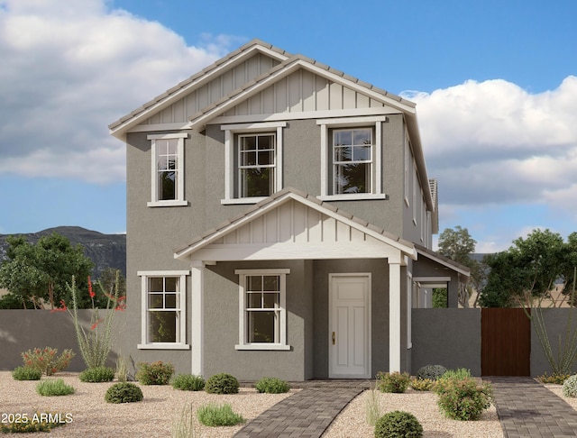 26209 N 19th Ln, Phoenix, AZ 85085 - view of front facade with board and batten siding, a gate, fence, and stucco siding