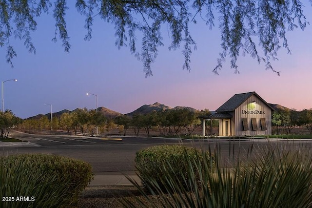 26209 N 19th Ln, Phoenix, AZ 85085 - yard at dusk featuring a mountain view