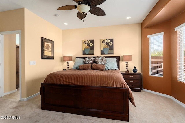 bedroom featuring a ceiling fan, recessed lighting, light carpet, and baseboards