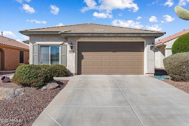 ranch-style house with a garage, driveway, and stucco siding