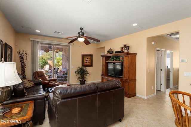 living area with a ceiling fan, recessed lighting, visible vents, and baseboards