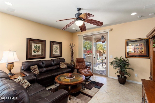 living room with a ceiling fan, recessed lighting, light tile patterned flooring, and baseboards