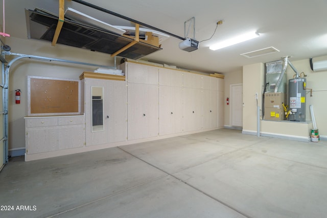 garage featuring water heater, a garage door opener, and heating unit