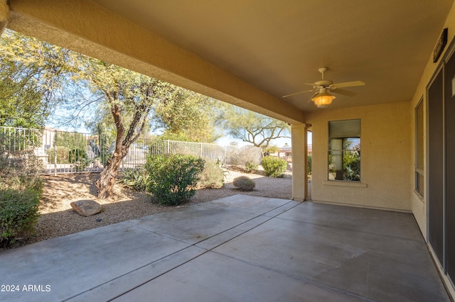 view of patio featuring ceiling fan