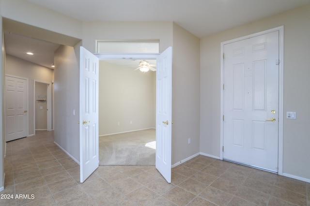 entrance foyer with light tile patterned floors