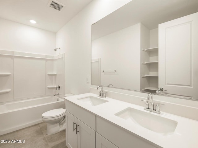 full bathroom featuring shower / tub combination, vanity, toilet, and tile patterned floors