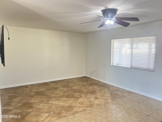 unfurnished room featuring light tile patterned flooring and ceiling fan