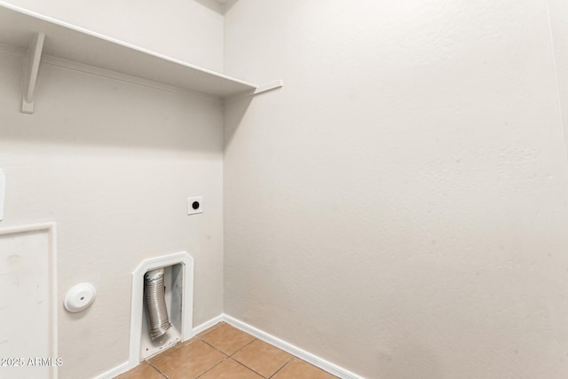 washroom featuring light tile patterned floors and hookup for an electric dryer