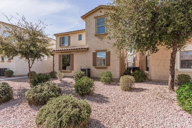 mediterranean / spanish-style house featuring central AC