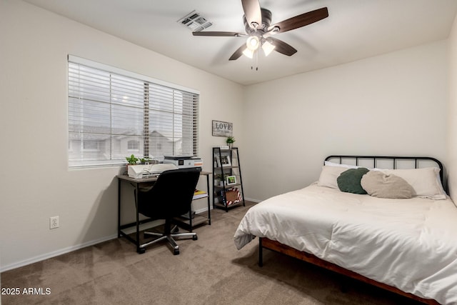 bedroom with carpet flooring, ceiling fan, and baseboards