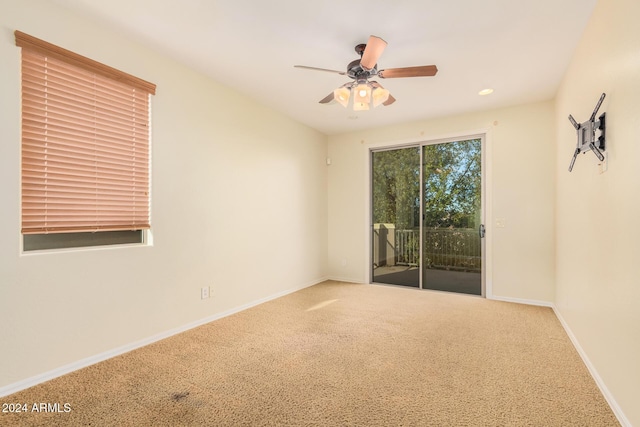 322 E Caribbean Dr, Casa Grande, AZ 85122 - carpeted spare room with a ceiling fan, baseboards, and recessed lighting