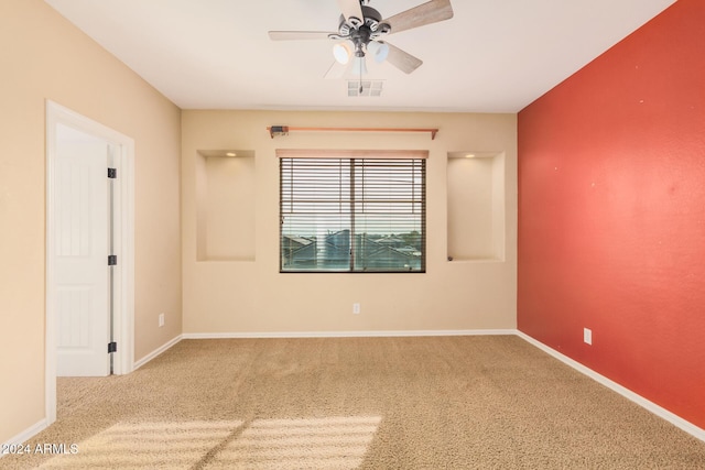 322 E Caribbean Dr, Casa Grande, AZ 85122 - empty room featuring carpet, a ceiling fan, and baseboards
