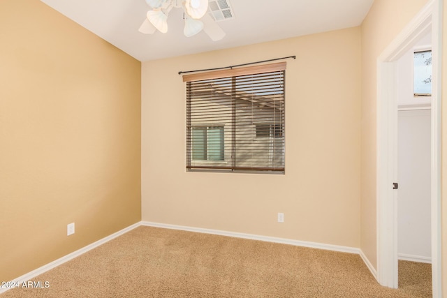 322 E Caribbean Dr, Casa Grande, AZ 85122 - empty room featuring carpet, a ceiling fan, and baseboards