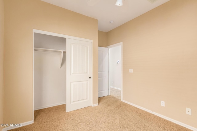 322 E Caribbean Dr, Casa Grande, AZ 85122 - unfurnished bedroom with carpet floors, a closet, baseboards, and a ceiling fan