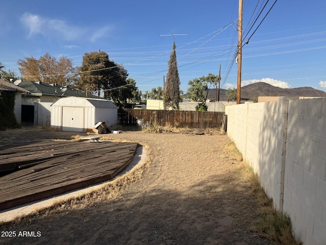 9033 N 15th Dr, Phoenix, AZ 85021 - fenced backyard with a shed and an outdoor structure