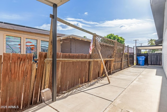 9033 N 15th Dr, Phoenix, AZ 85021 - view of patio / terrace featuring fence and a gate