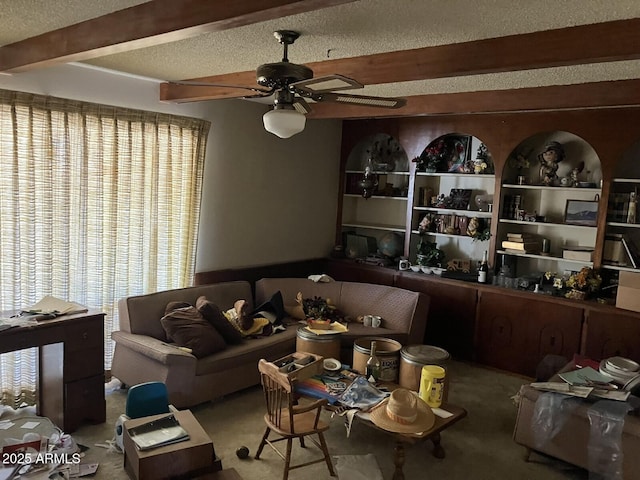 9033 N 15th Dr, Phoenix, AZ 85021 - carpeted living room featuring beam ceiling, ceiling fan, healthy amount of natural light, and a textured ceiling