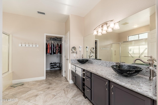 bathroom with vanity and walk in shower