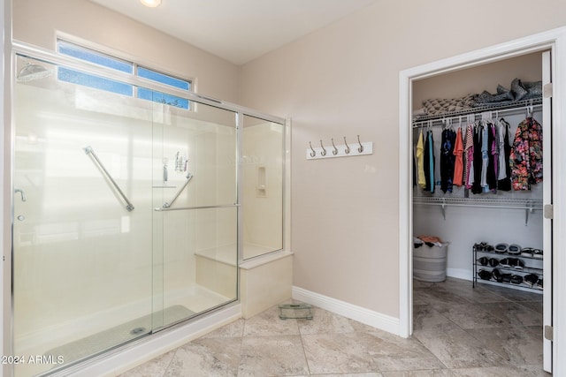 bathroom featuring an enclosed shower