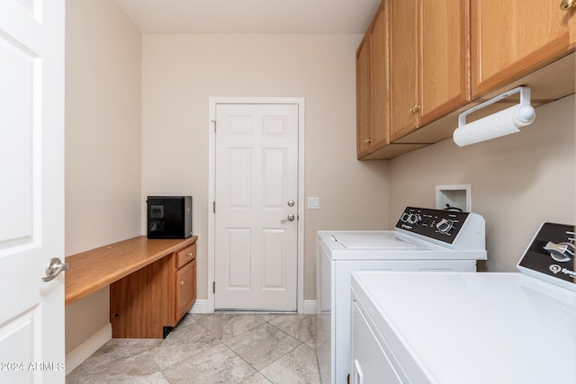 laundry room with washer and dryer