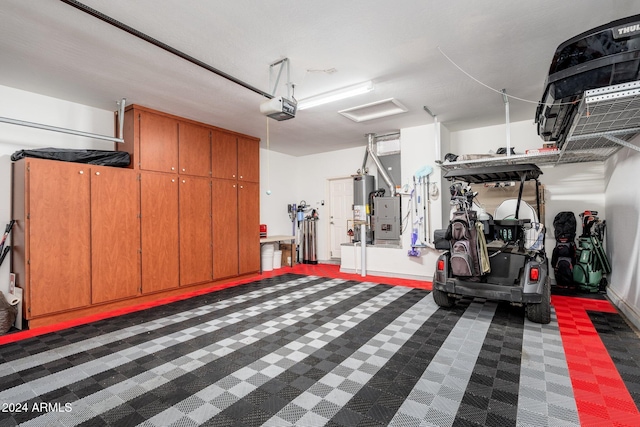 garage with a garage door opener and water heater