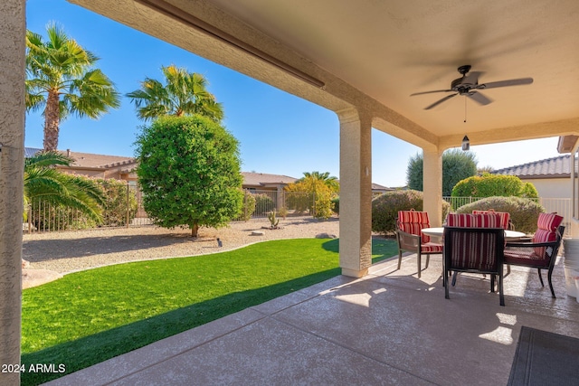 view of patio with ceiling fan