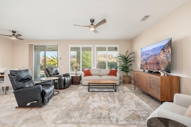 living room featuring ceiling fan