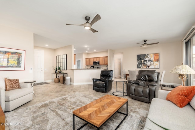 living room featuring ceiling fan