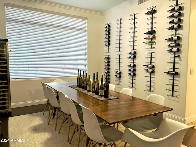 dining space featuring ornamental molding