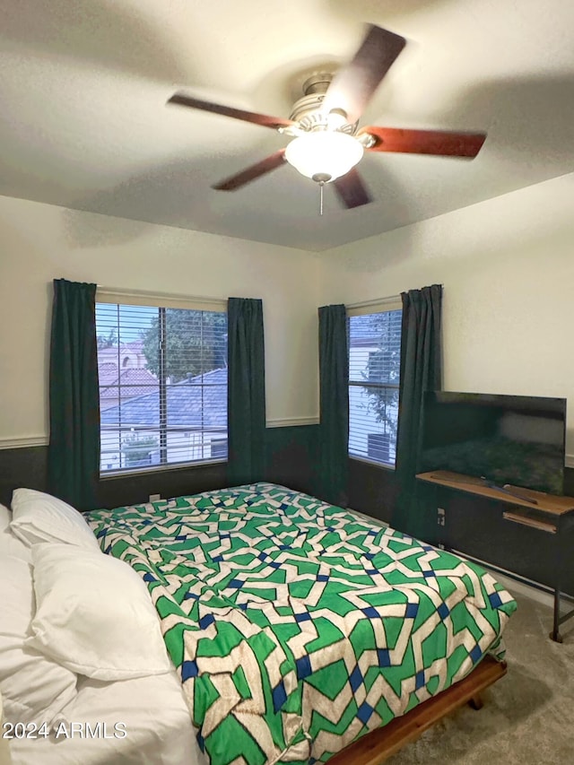 bedroom featuring carpet and ceiling fan