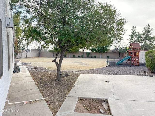 view of yard with a playground