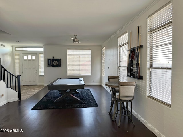 game room with ceiling fan, dark hardwood / wood-style floors, crown molding, and pool table