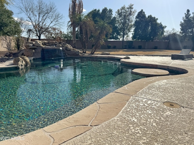 view of pool featuring pool water feature