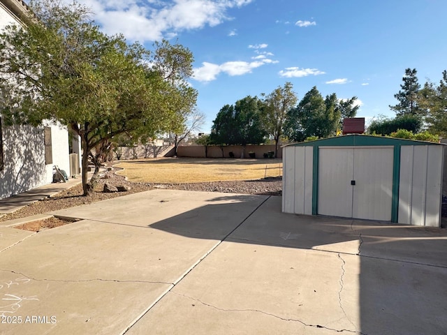 view of patio with a shed